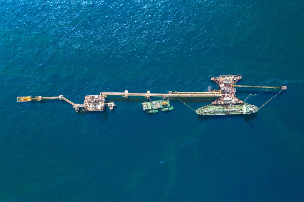 Liquefied Natural Gas (LNG) tanker moored at an offshore terminal.